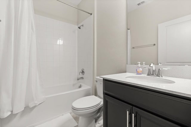 bathroom with toilet, vanity, visible vents, and shower / tub combo with curtain