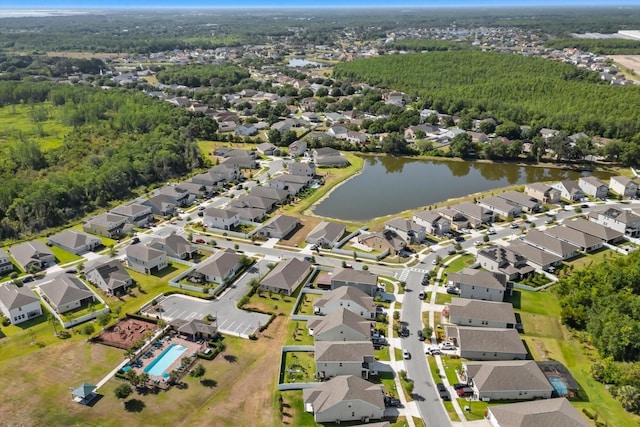 aerial view featuring a water view and a residential view