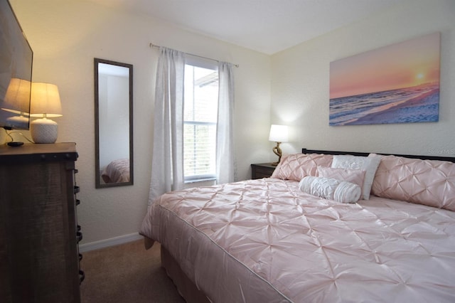 626 Verona Ave, Davenport, FL 33897 - carpeted bedroom featuring baseboards