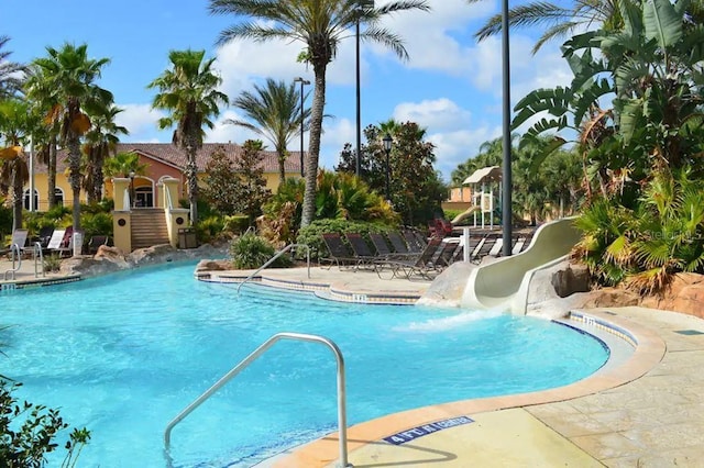 626 Verona Ave, Davenport, FL 33897 - pool featuring a water slide and a patio area