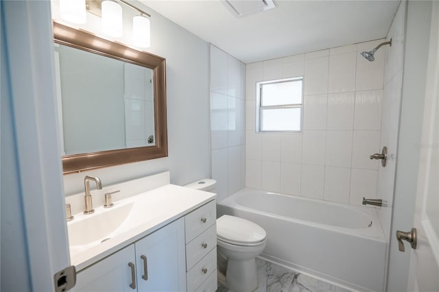 bathroom featuring vanity, marble finish floor, bathtub / shower combination, and toilet