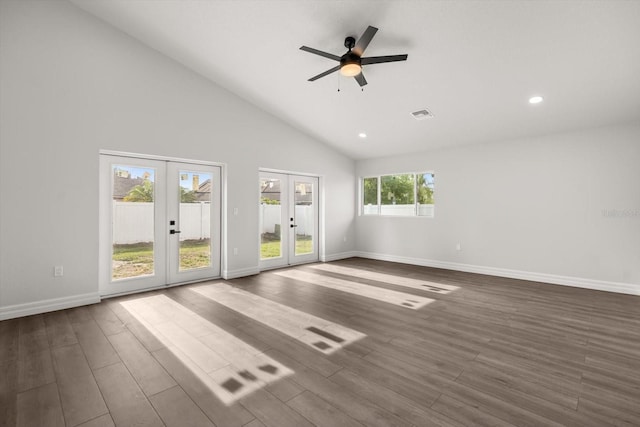 unfurnished room featuring dark wood-style floors, ceiling fan, french doors, and baseboards