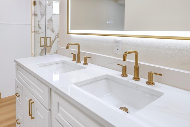 40 W Laurel St, Apopka, FL 32703 - full bathroom featuring a marble finish shower, double vanity, and a sink