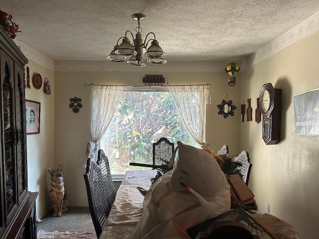 dining area with carpet, a textured ceiling, and a notable chandelier
