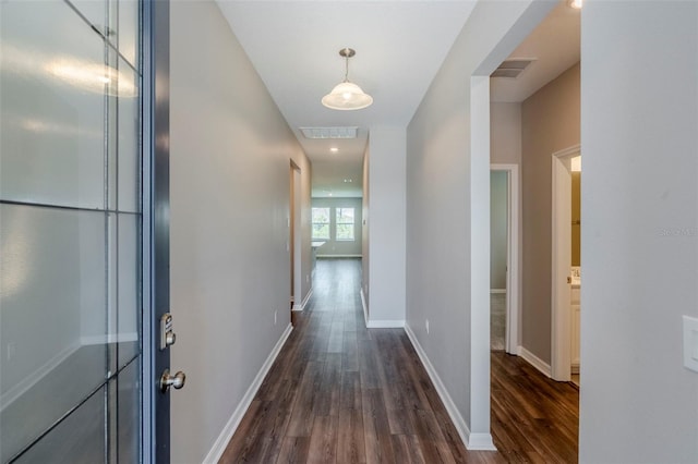 507 Daylily Blvd, Nokomis, FL 34275 - hallway with dark wood finished floors and baseboards