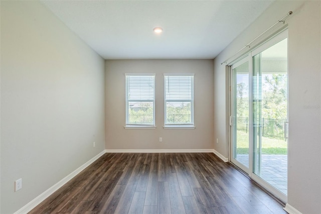 507 Daylily Blvd, Nokomis, FL 34275 - unfurnished room with dark wood-type flooring, baseboards, and recessed lighting