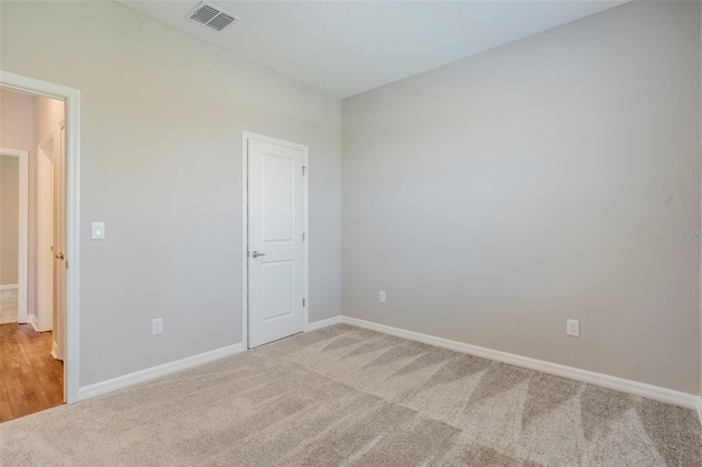 507 Daylily Blvd, Nokomis, FL 34275 - spare room with light colored carpet and baseboards