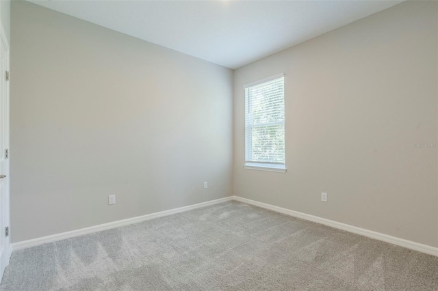 507 Daylily Blvd, Nokomis, FL 34275 - carpeted empty room featuring baseboards