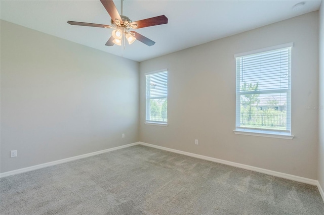507 Daylily Blvd, Nokomis, FL 34275 - carpeted empty room with healthy amount of natural light, baseboards, and ceiling fan