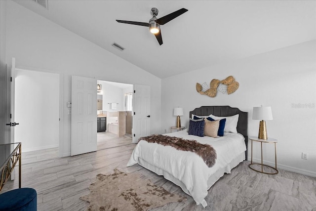 119 Argyle Gate Loop Rd, Dundee, FL 33838 - bedroom featuring baseboards, connected bathroom, high vaulted ceiling, and ceiling fan