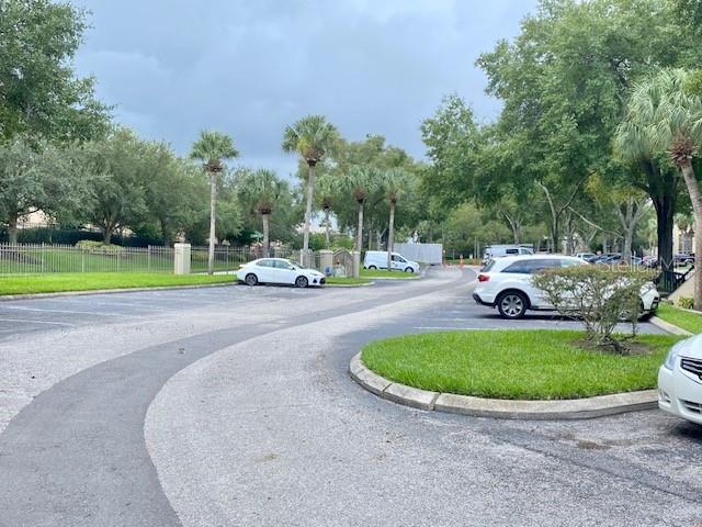 224 Afton Sq Unit 301, Altamonte Springs, FL 32714 - view of asphalt street with curbs