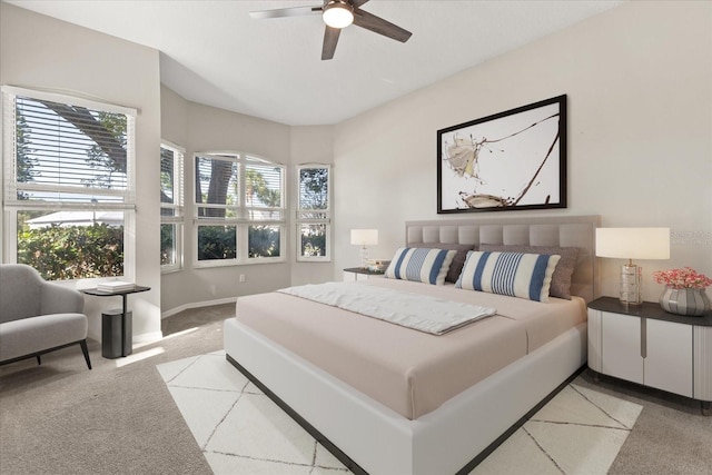 14841 Faversham Cir, Orlando, FL 32826 - bedroom with light colored carpet, baseboards, and a ceiling fan