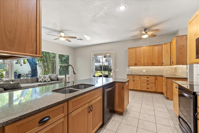 14841 Faversham Cir, Orlando, FL 32826 - kitchen featuring ceiling fan, a sink, dishwasher, electric range, and decorative backsplash