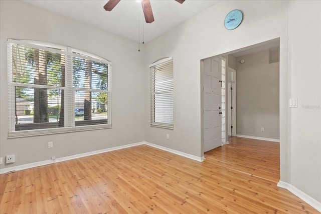 14841 Faversham Cir, Orlando, FL 32826 - unfurnished room with light wood-type flooring, ceiling fan, and baseboards