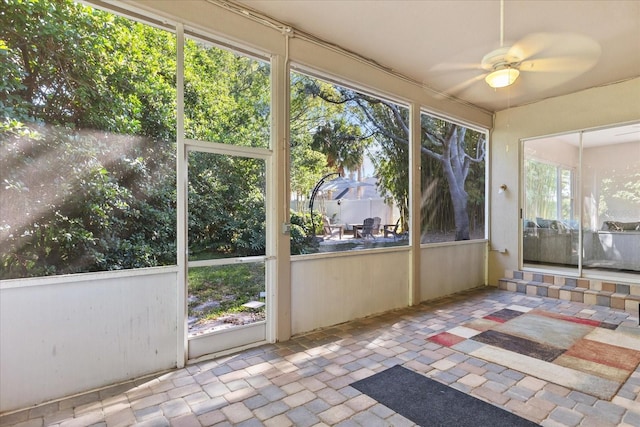 14841 Faversham Cir, Orlando, FL 32826 - unfurnished sunroom with a ceiling fan