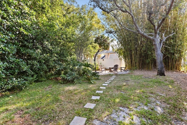 14841 Faversham Cir, Orlando, FL 32826 - view of yard featuring a patio area