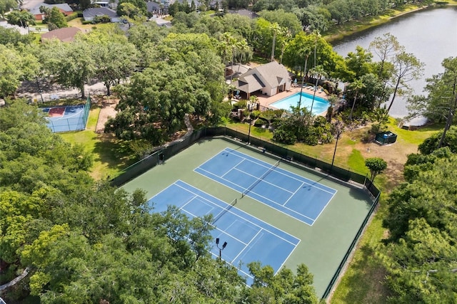 14841 Faversham Cir, Orlando, FL 32826 - view of tennis court with a water view