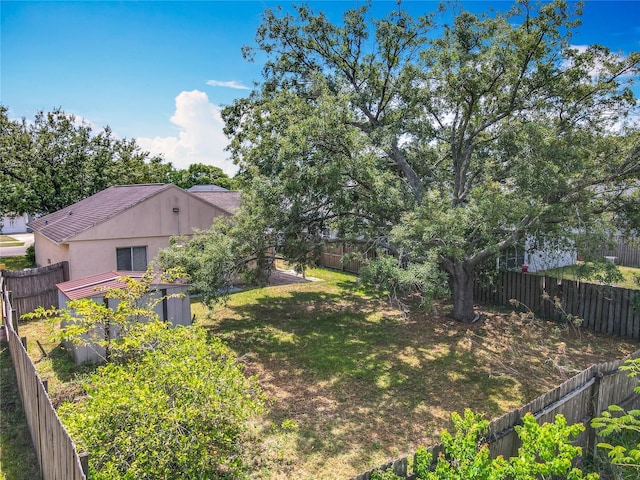 view of yard featuring a fenced backyard