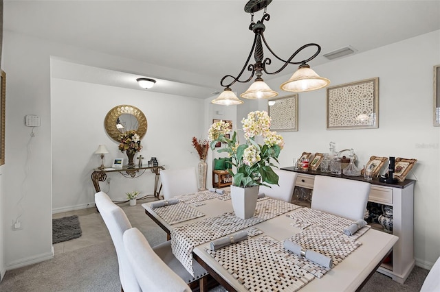 1220 Tahitian Sunrise Dr, Plant City, FL 33565 - dining area featuring visible vents, light carpet, and baseboards