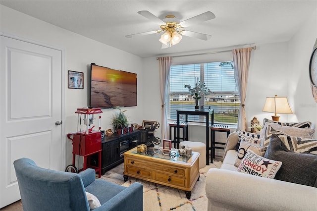 1220 Tahitian Sunrise Dr, Plant City, FL 33565 - living room featuring a ceiling fan