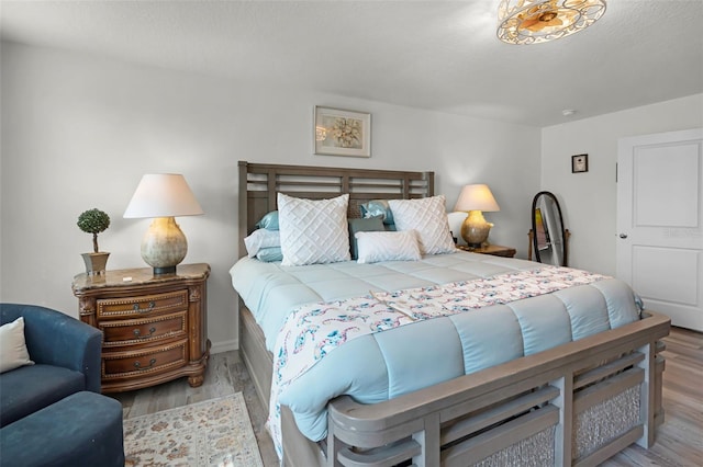 1220 Tahitian Sunrise Dr, Plant City, FL 33565 - bedroom featuring wood finished floors