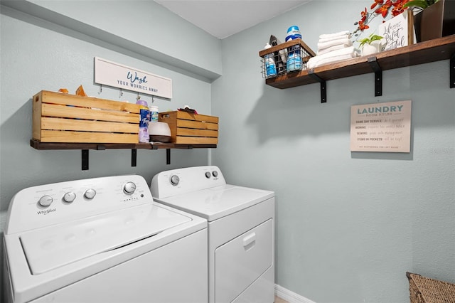 1220 Tahitian Sunrise Dr, Plant City, FL 33565 - washroom with washing machine and clothes dryer, laundry area, and baseboards