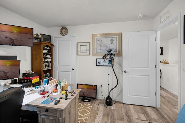 1220 Tahitian Sunrise Dr, Plant City, FL 33565 - office space with baseboards, visible vents, and light wood-style floors