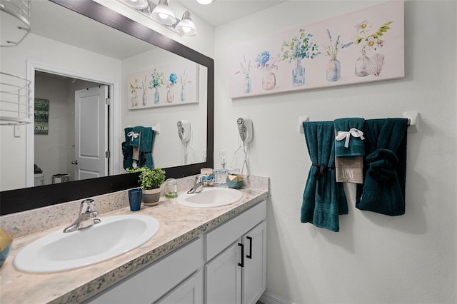 1220 Tahitian Sunrise Dr, Plant City, FL 33565 - full bath featuring double vanity and a sink