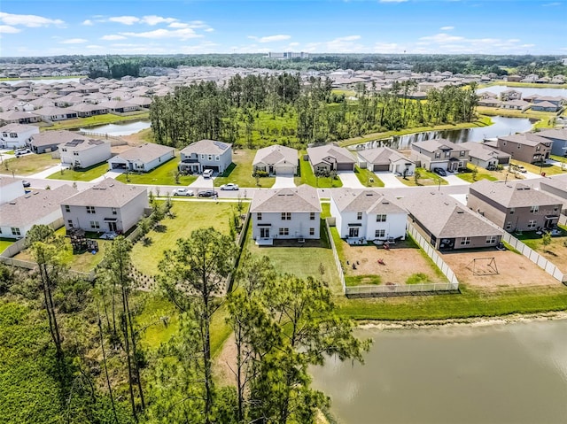 1220 Tahitian Sunrise Dr, Plant City, FL 33565 - drone / aerial view featuring a residential view and a water view