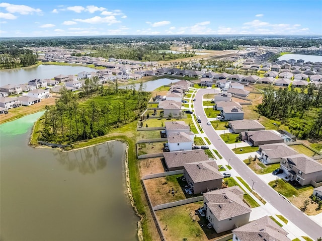 1220 Tahitian Sunrise Dr, Plant City, FL 33565 - drone / aerial view with a residential view and a water view