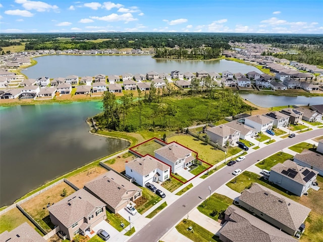 1220 Tahitian Sunrise Dr, Plant City, FL 33565 - aerial view with a residential view and a water view