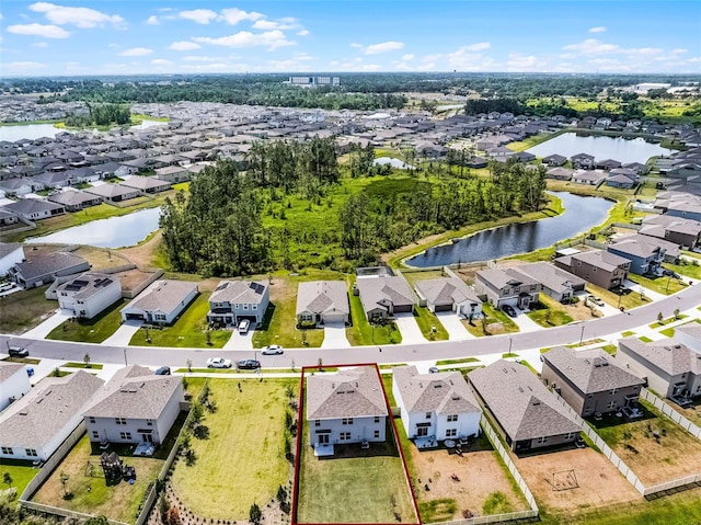 1220 Tahitian Sunrise Dr, Plant City, FL 33565 - birds eye view of property with a residential view and a water view