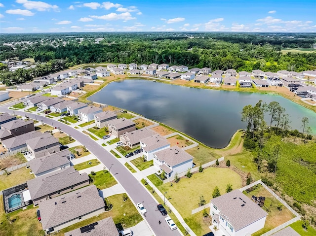1220 Tahitian Sunrise Dr, Plant City, FL 33565 - aerial view featuring a water view and a residential view