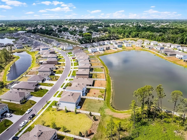 1220 Tahitian Sunrise Dr, Plant City, FL 33565 - birds eye view of property with a residential view and a water view