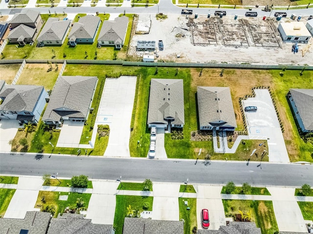 1220 Tahitian Sunrise Dr, Plant City, FL 33565 - birds eye view of property with a residential view