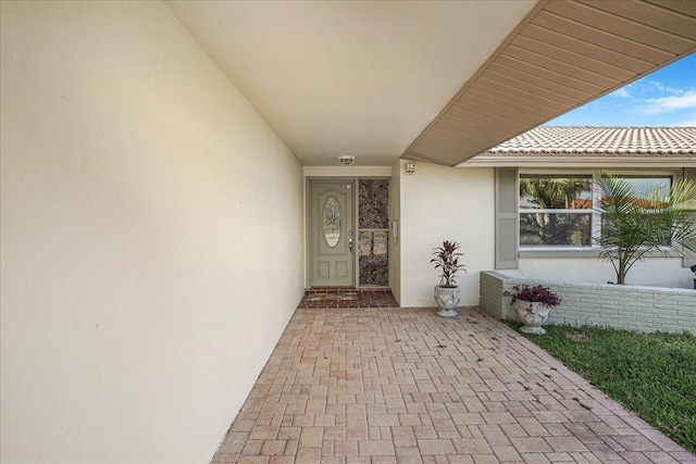 4043 Topsail Trl, New Port Richey, FL 34652 - doorway to property with stucco siding