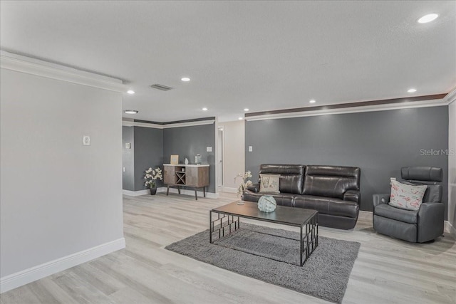 4043 Topsail Trl, New Port Richey, FL 34652 - living room with baseboards, ornamental molding, and light wood-style flooring