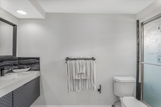 4043 Topsail Trl, New Port Richey, FL 34652 - full bath with vanity, baseboards, an enclosed shower, and toilet