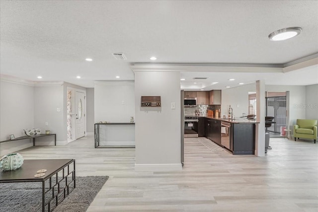 4043 Topsail Trl, New Port Richey, FL 34652 - living area featuring visible vents, light wood-type flooring, baseboards, ornamental molding, and recessed lighting