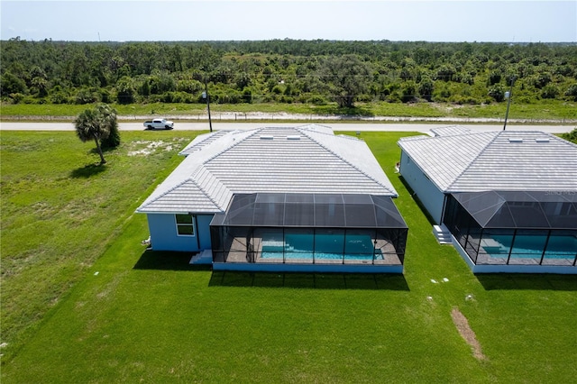 223 Rotonda Blvd S, Rotonda West, FL 33947 - view of subject property featuring a heavily wooded area and a pool area