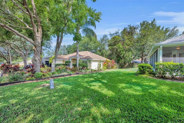 view of yard featuring fence