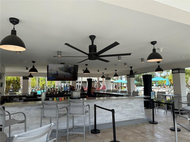 exterior space featuring ceiling fan and outdoor wet bar