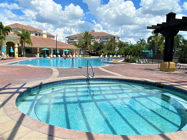 community pool featuring a patio