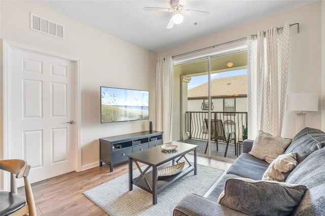 4024 Breakview Dr Unit 40604, Orlando, FL 32819 - living area featuring ceiling fan and light wood-style flooring