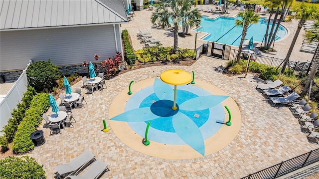 exterior space featuring a pool, a patio, and a fenced backyard