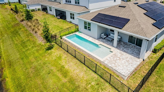view of pool with a patio, an outdoor living space, a fenced in pool, a fenced backyard, and a lawn