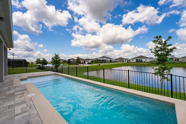 view of swimming pool with a fenced backyard, a water view, a fenced in pool, and a residential view