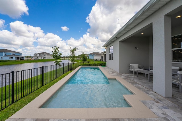 view of swimming pool with a fenced backyard, a fenced in pool, a water view, a patio, and a residential view