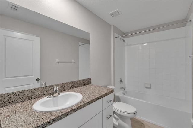 full bathroom with toilet, visible vents, tile patterned flooring, and vanity