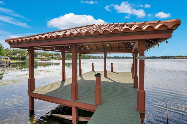 view of dock with a water view